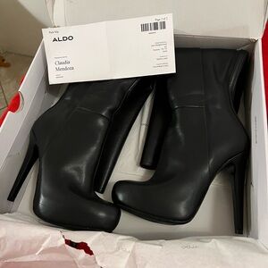 Aldo Black Heeled BootsOne of the boots the heel has scratches nothing serious